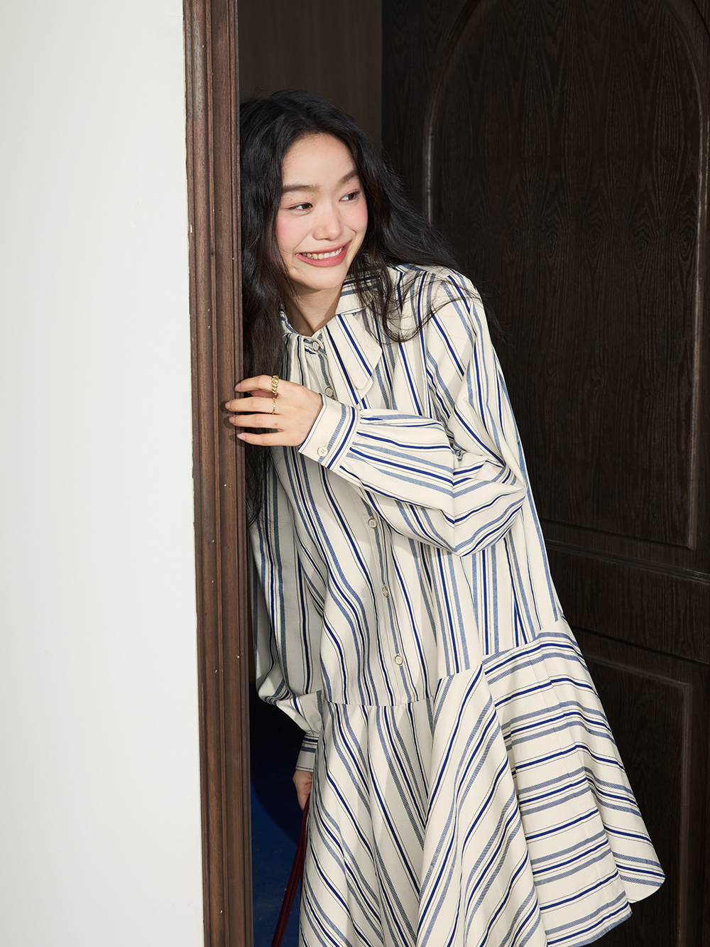 Vest and Striped Dress