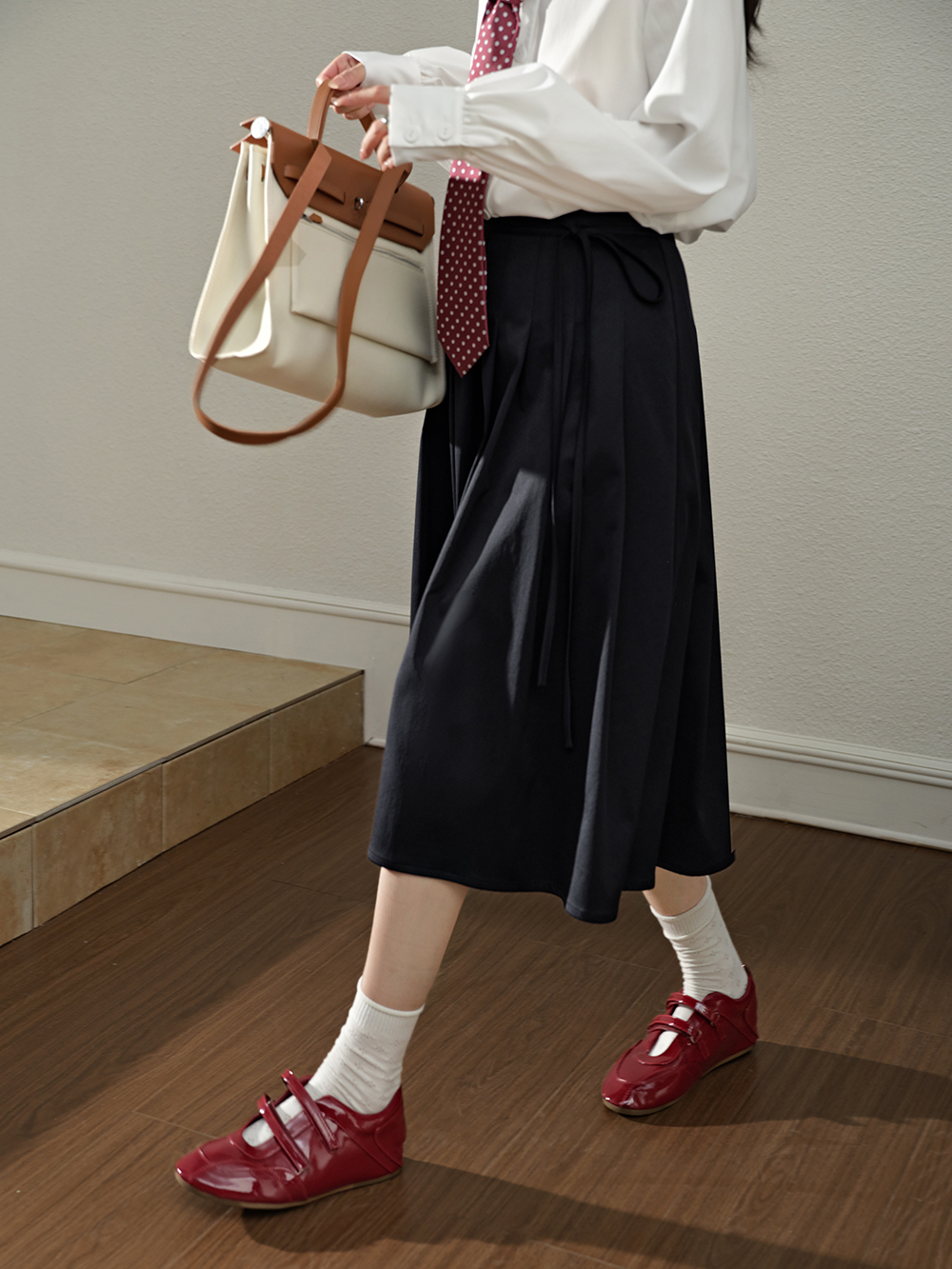 Belted Jacket and Pleated Skirt