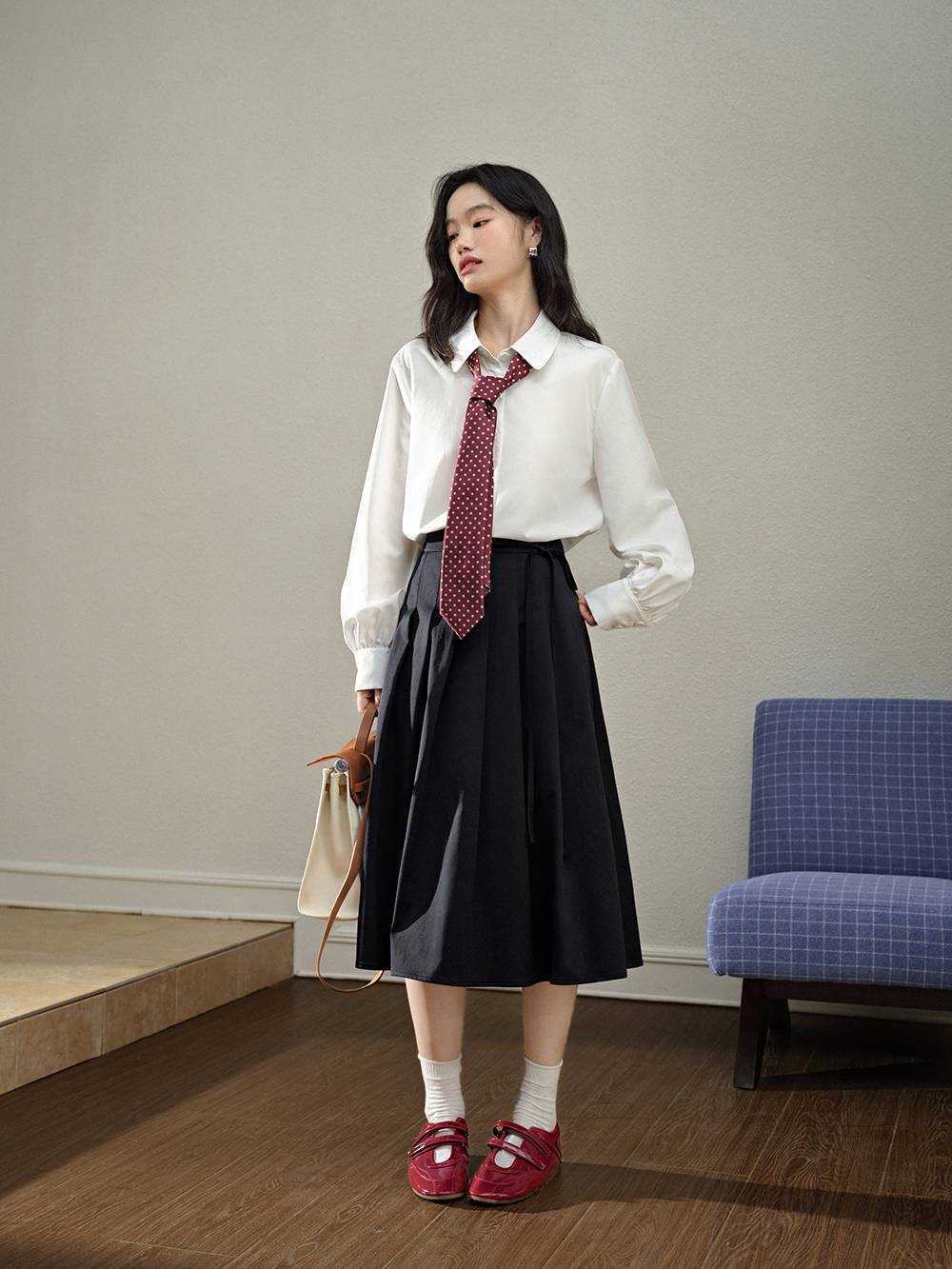 Belted Jacket and Pleated Skirt