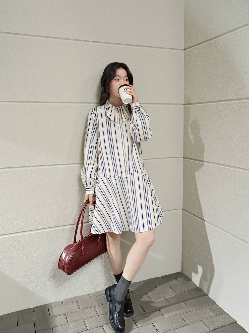 Vest and Striped Dress